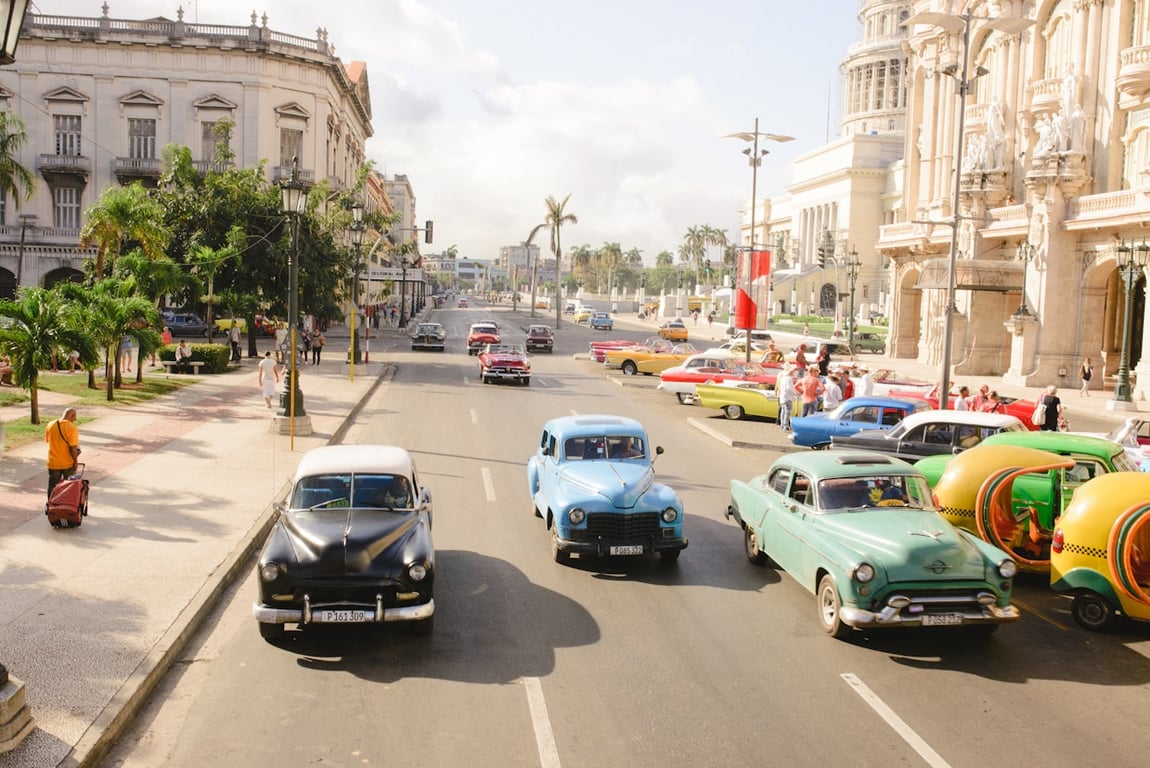 Cuba street scene with vintage cars